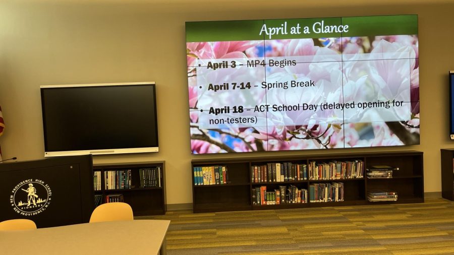 This shows the big screen in the media center that some classes use for presentations.