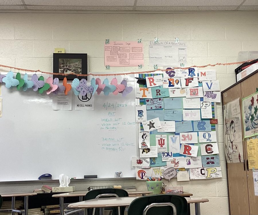 Butterflies hanging from Dr. Hasson’s room with something positive written on it.