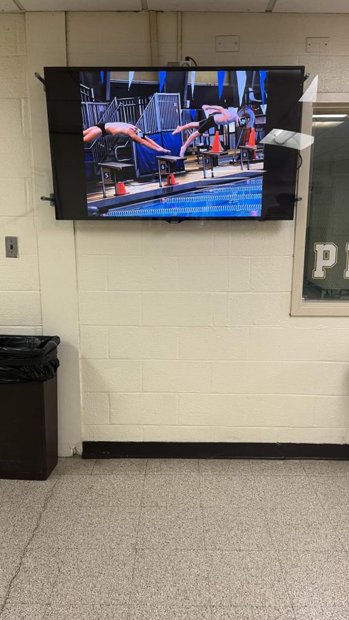 This shows a tv screen down the hall that shows videos done by the class “Media Design”.