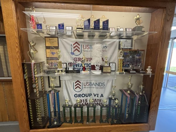 Glass case displaying various
awards for the NPHS marching band.