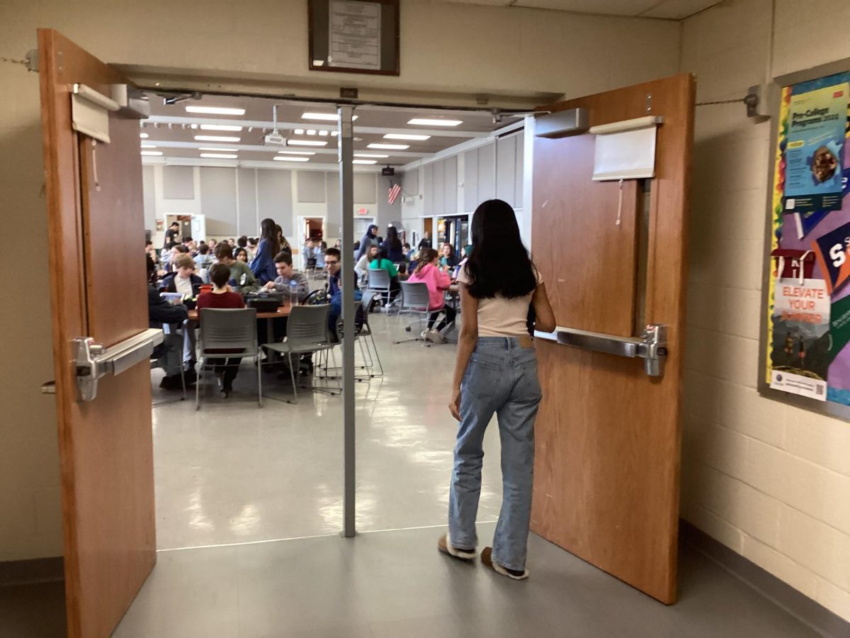 HS student walks into cafeteria, hungry.