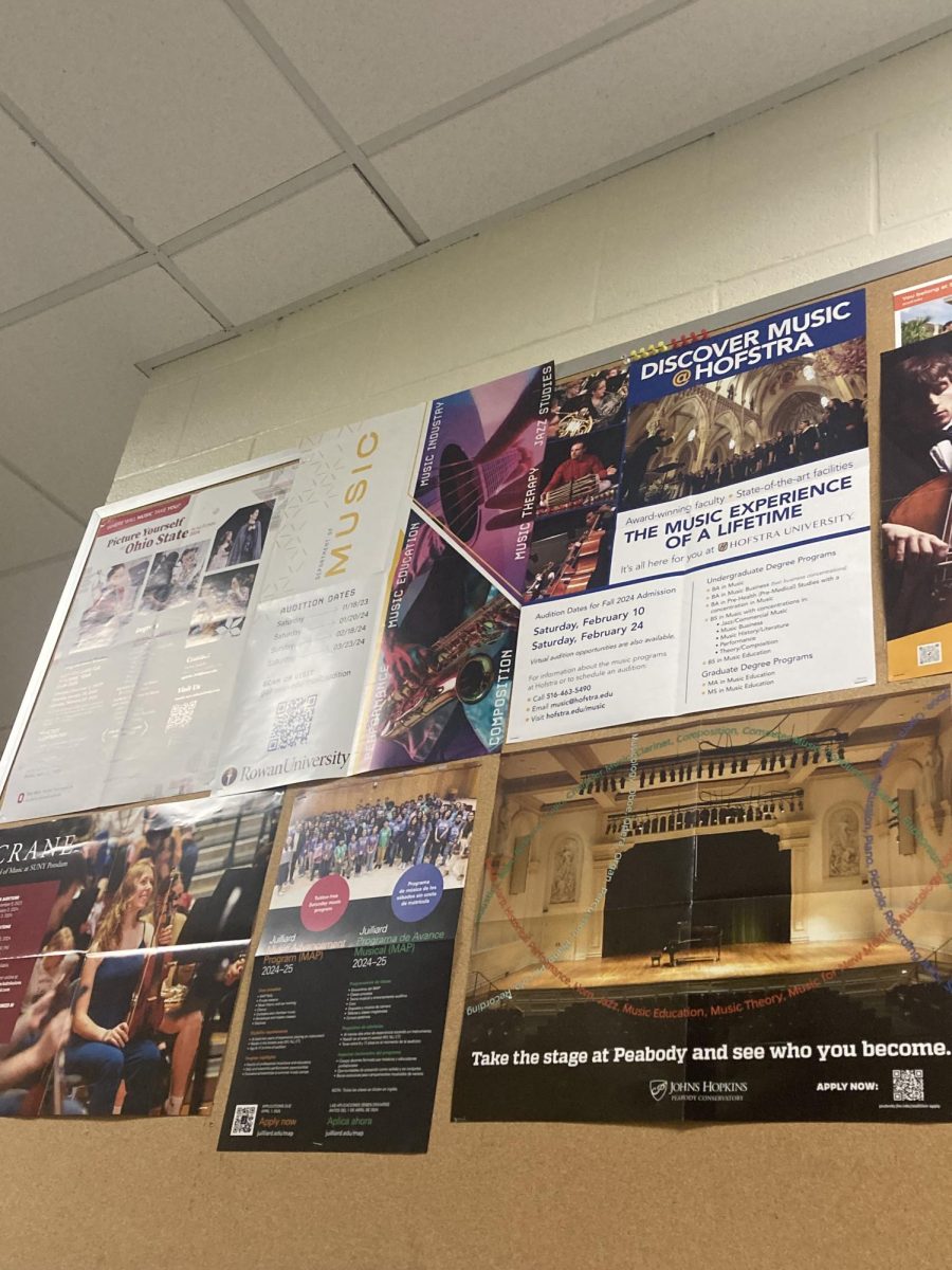 Bulletin board of musical ensemble opportunities outside of the chorus room.