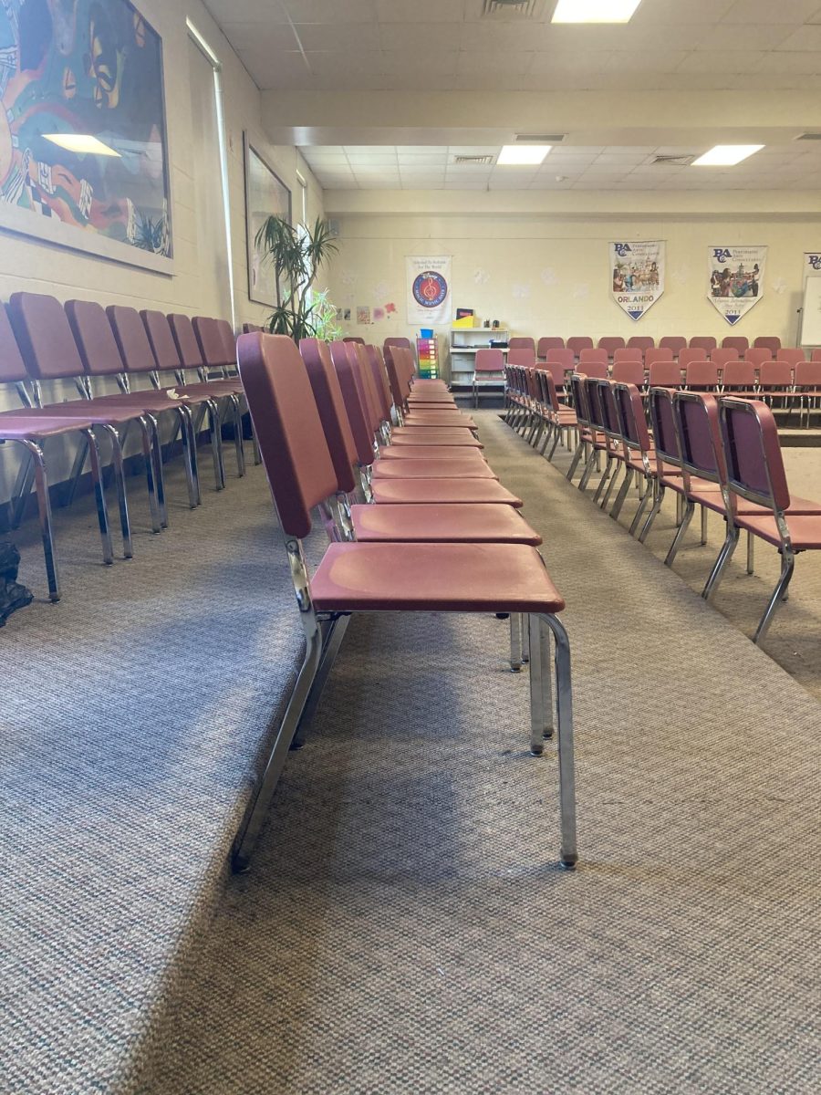 Rows of chairs in the chorus room.