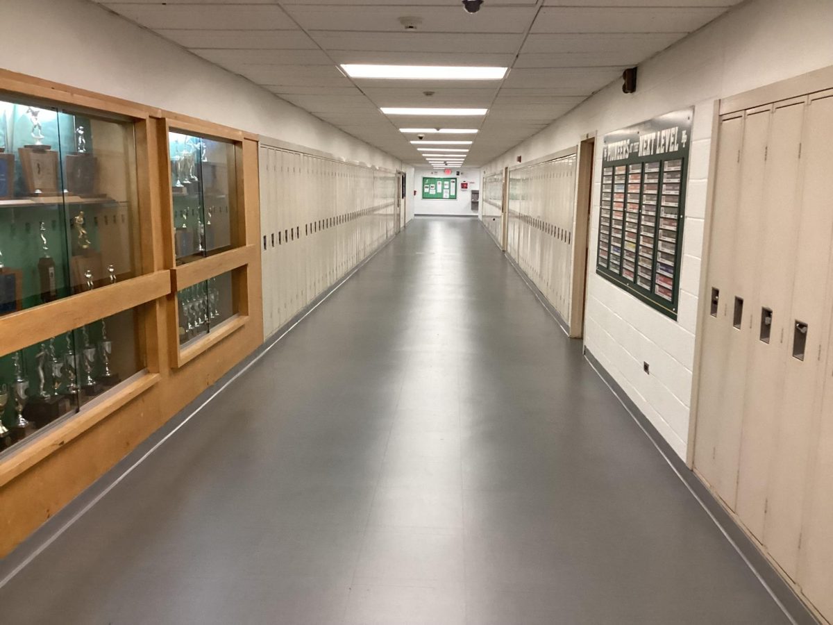 Floor of the hallway containing the High School gym